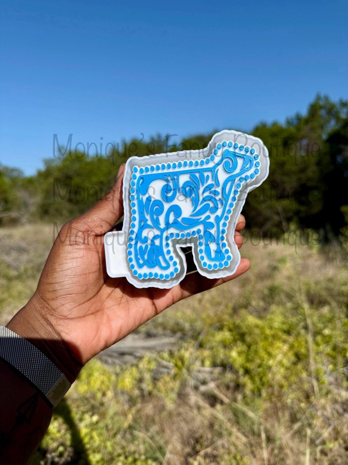 Cow Freshie featuring a scroll design